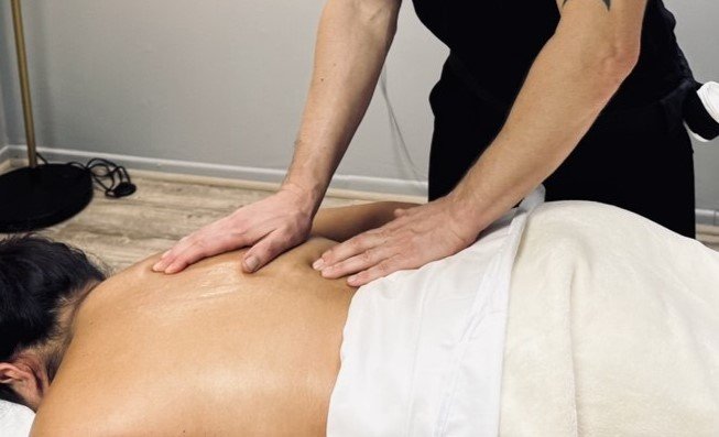 Close-up of hands giving a soothing Swedish massage.